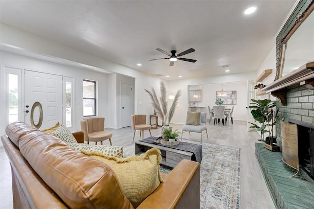 2617 NW 58th St, Oklahoma City, OK 73112 - living room featuring ceiling fan, recessed lighting, and wood finished floors