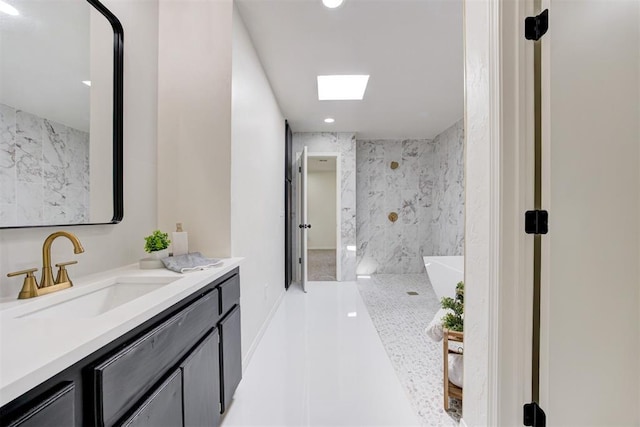 2617 NW 58th St, Oklahoma City, OK 73112 - full bathroom with vanity, a marble finish shower, recessed lighting, and a tub