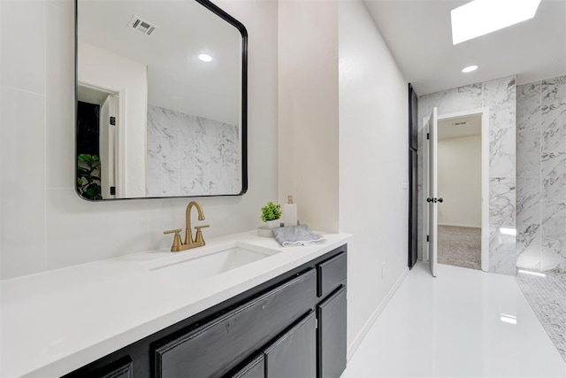2617 NW 58th St, Oklahoma City, OK 73112 - bathroom featuring vanity and recessed lighting