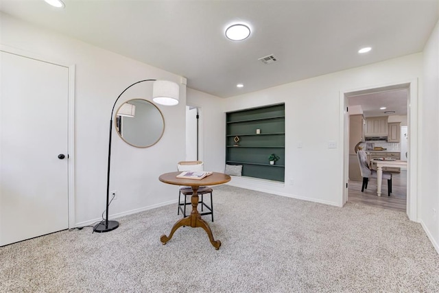 2617 NW 58th St, Oklahoma City, OK 73112 - interior space featuring carpet flooring, built in shelves, and recessed lighting