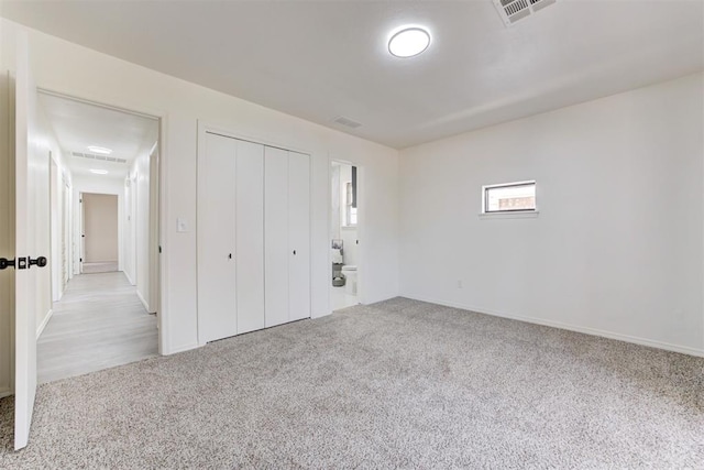 2617 NW 58th St, Oklahoma City, OK 73112 - unfurnished bedroom featuring carpet and a closet
