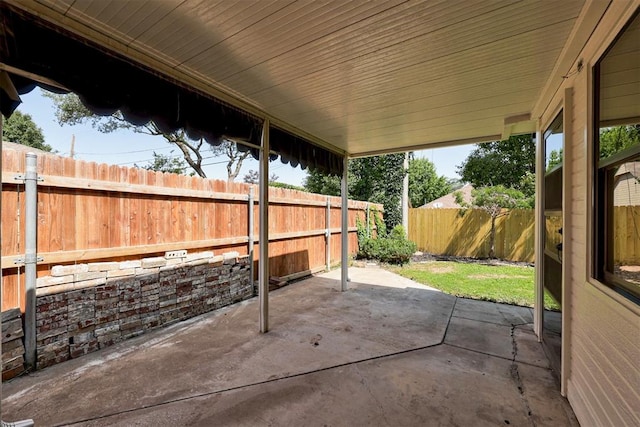 2617 NW 58th St, Oklahoma City, OK 73112 - fenced backyard featuring a patio area