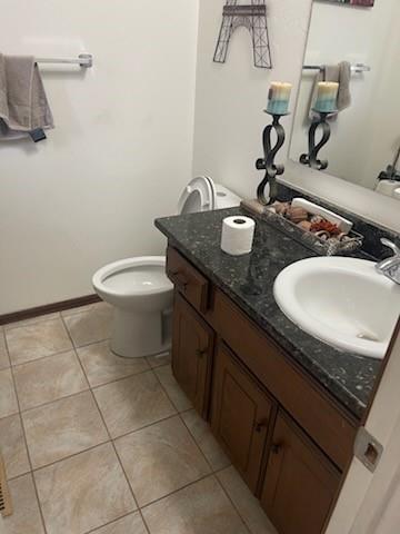 10625 White Oak Canyon Rd, Oklahoma City, OK 73162 - bathroom with vanity and tile patterned flooring