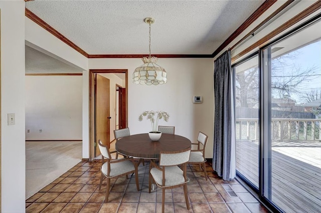 302 Tanglewood Dr, Yukon, OK 73099 - dining space with a textured ceiling, crown molding, and a chandelier