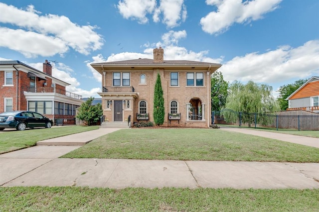 707 NE 18th St, Oklahoma City, OK 73105 - view of front facade featuring a chimney and brick siding