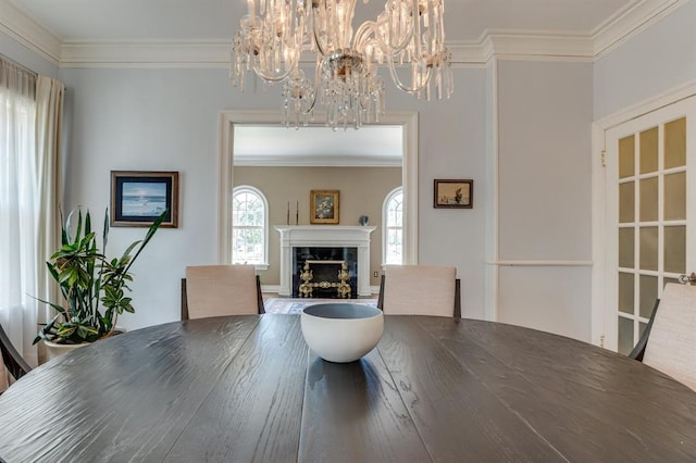707 NE 18th St, Oklahoma City, OK 73105 - dining area with ornamental molding, a chandelier, and a fireplace