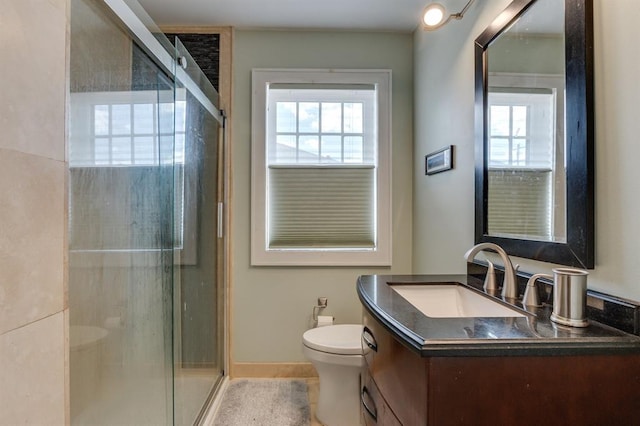 707 NE 18th St, Oklahoma City, OK 73105 - bathroom featuring plenty of natural light, vanity, and a stall shower