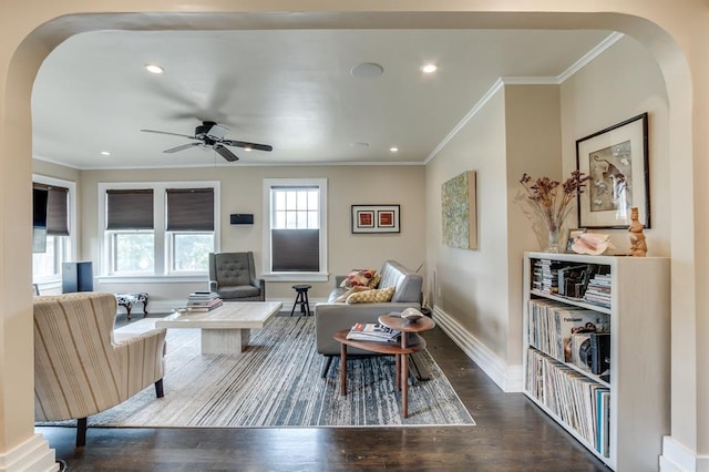 707 NE 18th St, Oklahoma City, OK 73105 - living room with arched walkways, wood finished floors, ornamental molding, ceiling fan, and recessed lighting