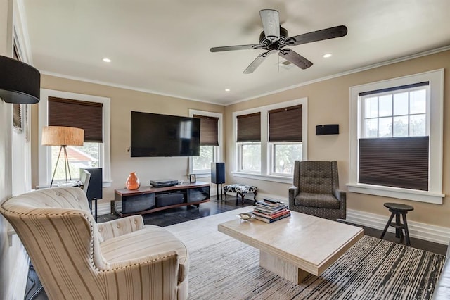 707 NE 18th St, Oklahoma City, OK 73105 - living room with plenty of natural light, wood finished floors, ornamental molding, a ceiling fan, and recessed lighting