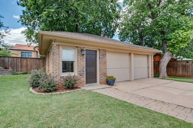 707 NE 18th St, Oklahoma City, OK 73105 - garage with concrete driveway