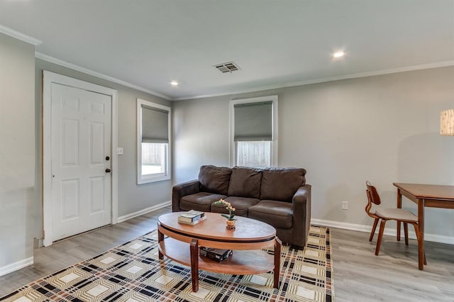 707 NE 18th St, Oklahoma City, OK 73105 - living area with light wood-style floors, recessed lighting, and crown molding