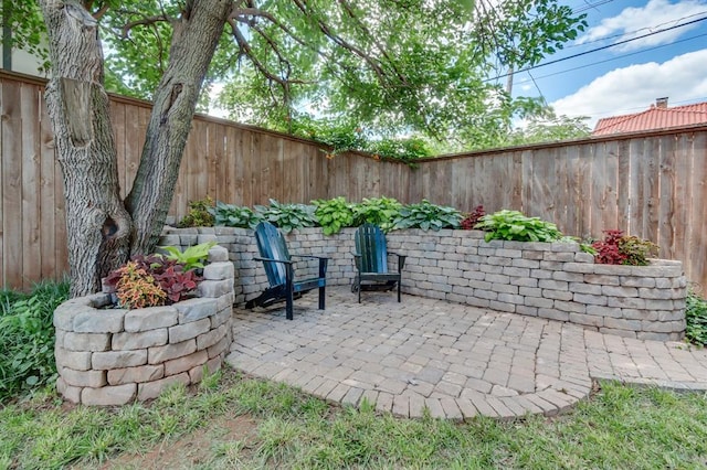 707 NE 18th St, Oklahoma City, OK 73105 - fenced backyard featuring a patio