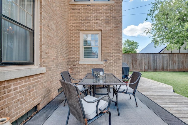 707 NE 18th St, Oklahoma City, OK 73105 - view of patio / terrace featuring outdoor dining area and a deck