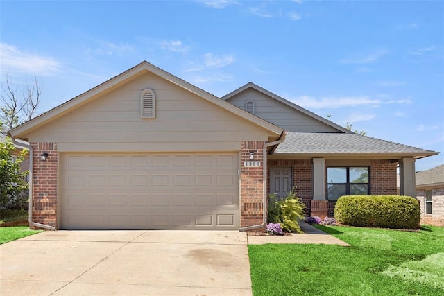 1908 E View Dr, Norman, OK 73071 - ranch-style home with brick siding, concrete driveway, a garage, a front yard, and roof with shingles