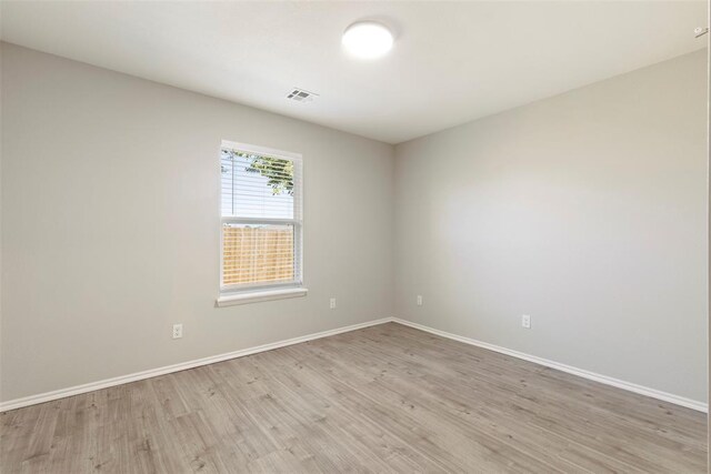 1908 E View Dr, Norman, OK 73071 - unfurnished room with light wood-type flooring and baseboards