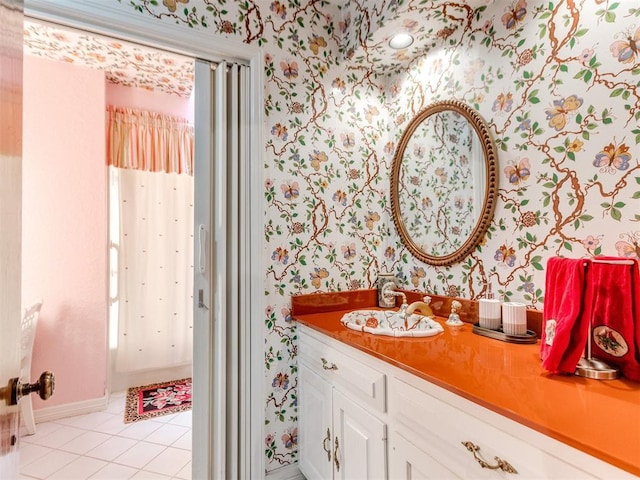 9 Country Club Rd, Shawnee, OK 74801 - bathroom featuring wallpapered walls, vanity, tile patterned floors, and baseboards