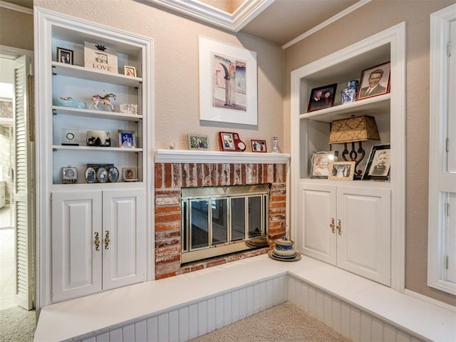 9 Country Club Rd, Shawnee, OK 74801 - carpeted living area with a fireplace, built in shelves, and crown molding