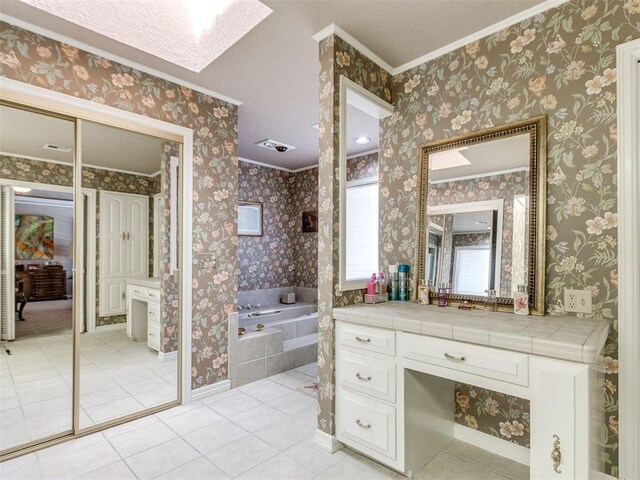 9 Country Club Rd, Shawnee, OK 74801 - full bathroom with tile patterned floors, a garden tub, ornamental molding, vanity, and a skylight