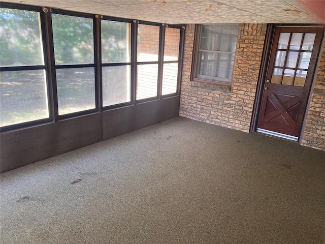 103 N Armor Ave, Canton, OK 73724 - unfurnished sunroom featuring carpet floors