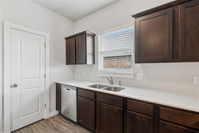 14308 Peach Tree Dr, Yukon, OK 73099 - kitchen featuring dishwasher, dark brown cabinets, light wood finished floors, and light countertops