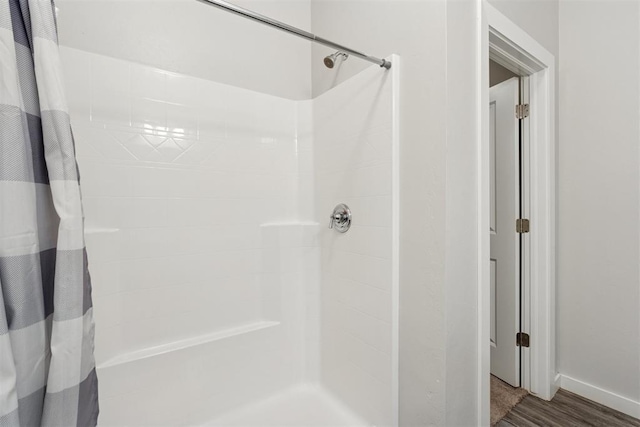14308 Peach Tree Dr, Yukon, OK 73099 - full bathroom with a shower with curtain and wood finished floors