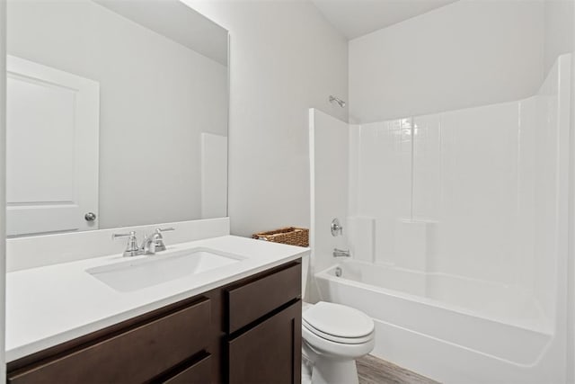 14308 Peach Tree Dr, Yukon, OK 73099 - full bathroom with vanity, shower / bath combination, and wood finished floors