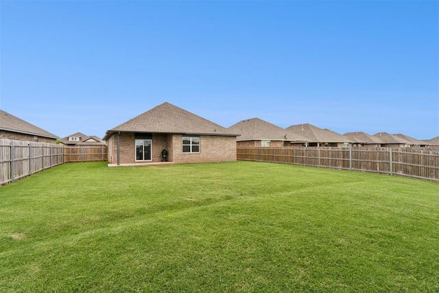 14308 Peach Tree Dr, Yukon, OK 73099 - view of fenced backyard