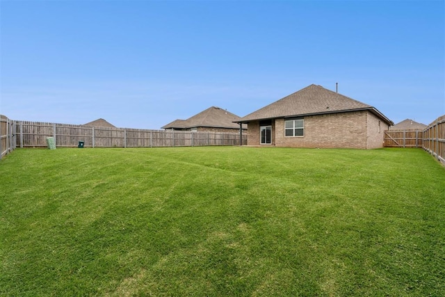14308 Peach Tree Dr, Yukon, OK 73099 - view of fenced backyard