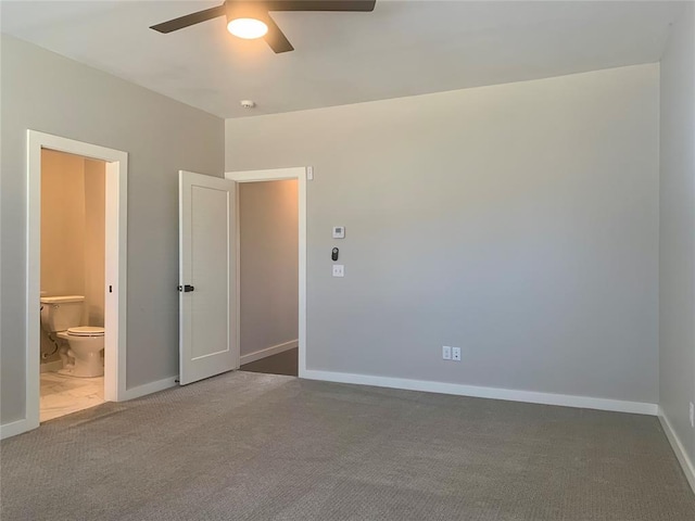 1305 NE 6th St, Oklahoma City, OK 73117 - unfurnished bedroom featuring carpet floors, connected bathroom, and ceiling fan