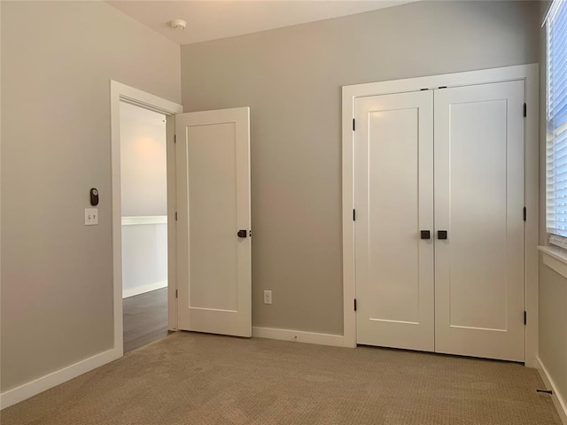 1305 NE 6th St, Oklahoma City, OK 73117 - unfurnished bedroom featuring light colored carpet and a closet