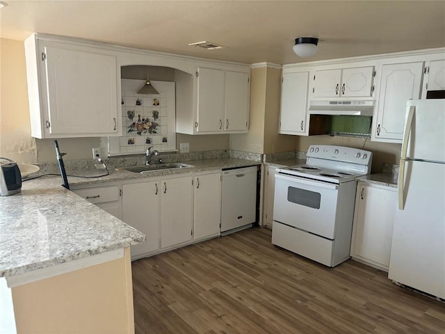 1540 Cross Rd, Altus, OK 29483 - kitchen with white appliances, under cabinet range hood, wood finished floors, white cabinets, and light countertops