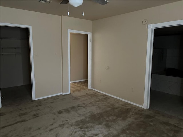 1540 Cross Rd, Altus, OK 29483 - unfurnished bedroom with a walk in closet, carpet floors, and a closet