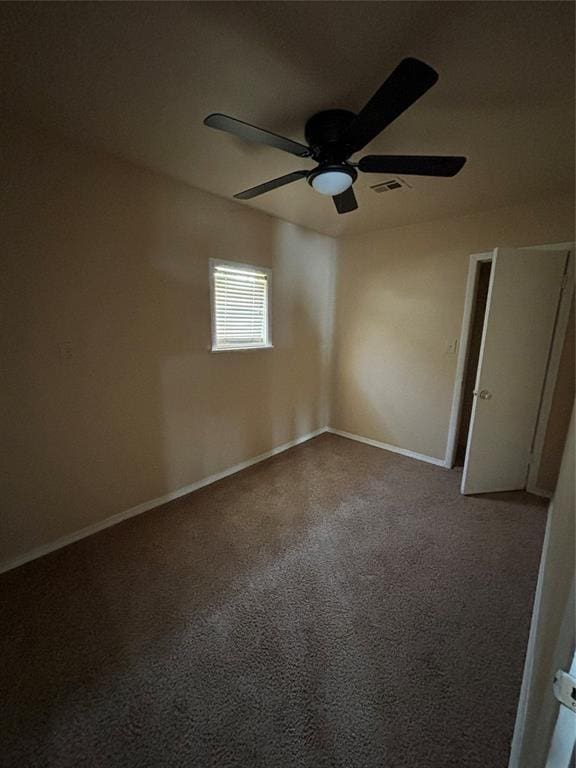 1540 Cross Rd, Altus, OK 29483 - spare room featuring a ceiling fan and carpet flooring