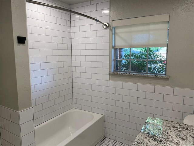 3017 Kelsey Dr, Edmond, OK 73013 - full bath featuring tile walls and bathtub / shower combination