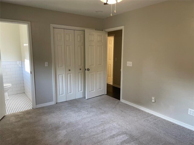 3017 Kelsey Dr, Edmond, OK 73013 - unfurnished bedroom with carpet flooring, ensuite bath, a closet, and baseboards