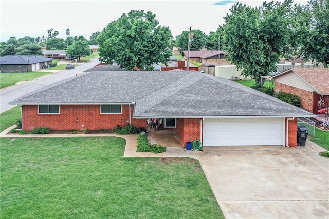 801 N Hunt St, Hydro, OK 73048 - ranch-style home with an attached garage, a shingled roof, brick siding, and driveway