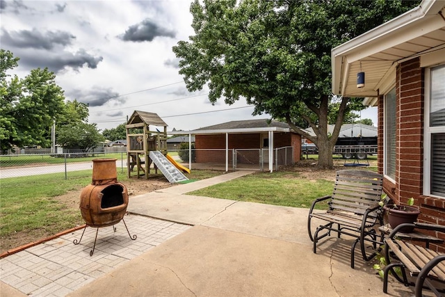 801 N Hunt St, Hydro, OK 73048 - view of patio / terrace with a playground