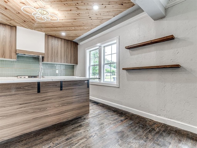 3157 NW 25th St, Oklahoma City, OK 73107 - kitchen featuring wood ceiling, dark wood-style floors, a textured wall, recessed lighting, and backsplash