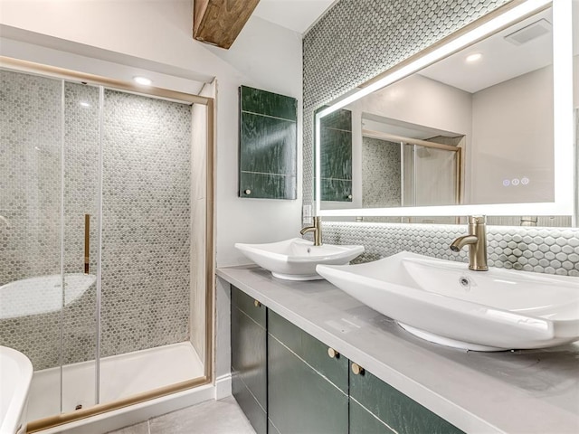 3157 NW 25th St, Oklahoma City, OK 73107 - full bathroom with a stall shower and double vanity