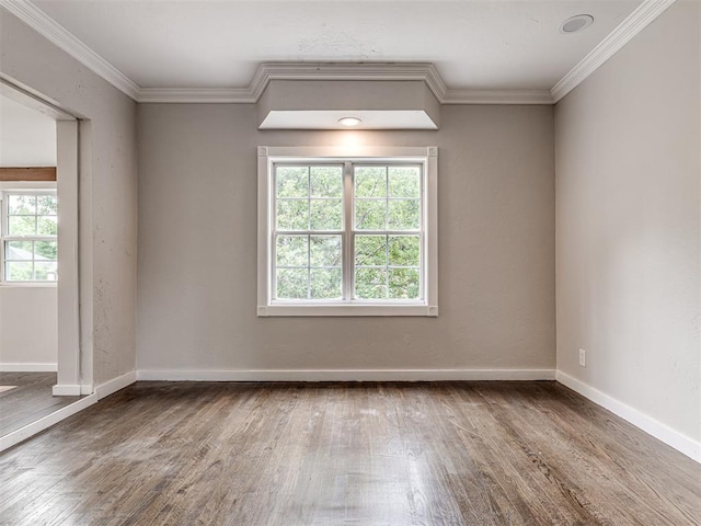 3157 NW 25th St, Oklahoma City, OK 73107 - unfurnished room with wood finished floors and crown molding