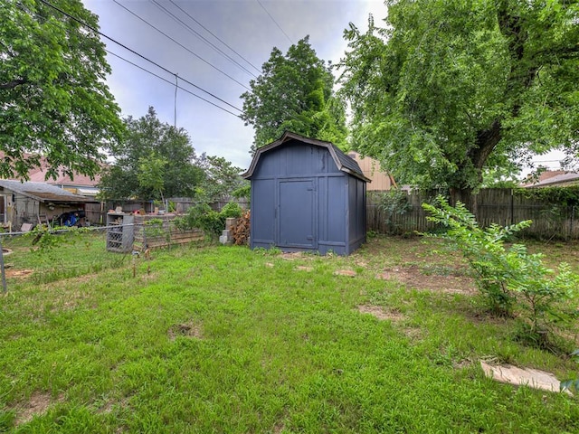 3157 NW 25th St, Oklahoma City, OK 73107 - fenced backyard with a storage unit
