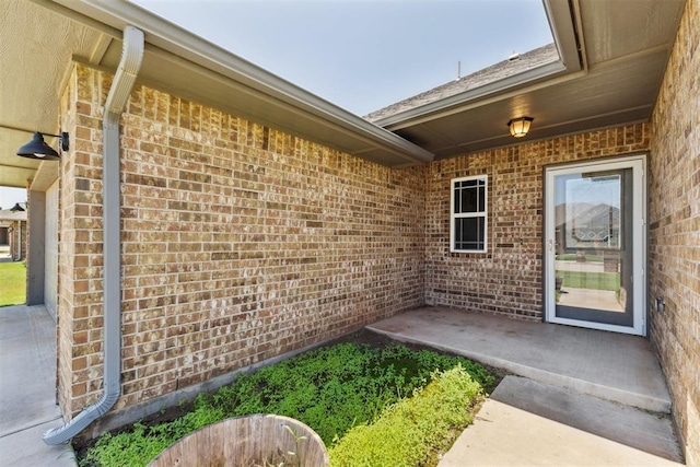 868 Phils Way, Piedmont, OK 73078 - property entrance featuring brick siding