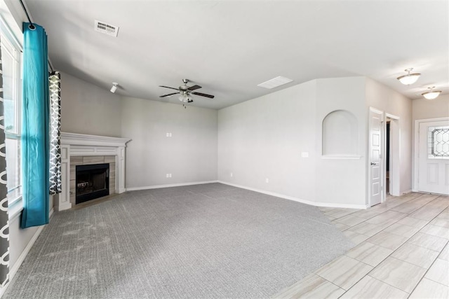 868 Phils Way, Piedmont, OK 73078 - unfurnished living room with ceiling fan and a tiled fireplace