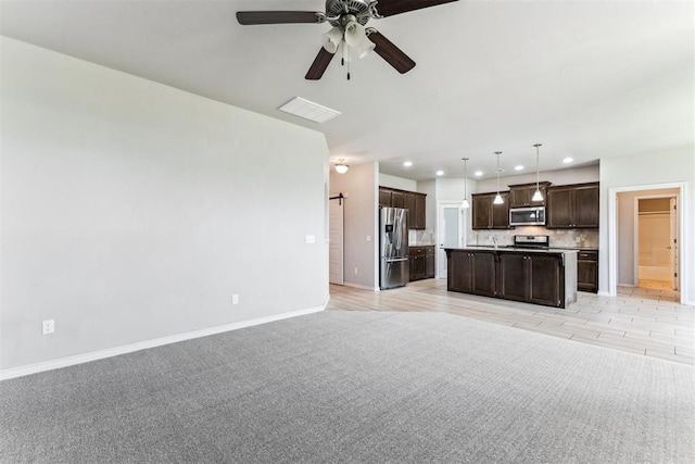 868 Phils Way, Piedmont, OK 73078 - unfurnished living room with ceiling fan, recessed lighting, and light colored carpet