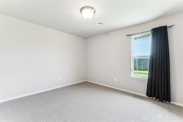 868 Phils Way, Piedmont, OK 73078 - spare room with light carpet and healthy amount of natural light