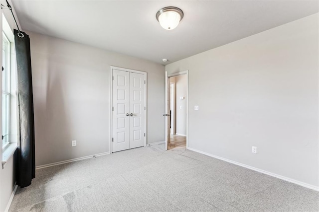 868 Phils Way, Piedmont, OK 73078 - unfurnished bedroom with light colored carpet and a closet