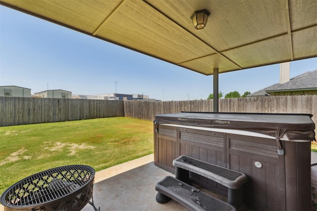 868 Phils Way, Piedmont, OK 73078 - fenced backyard featuring a hot tub and a patio area