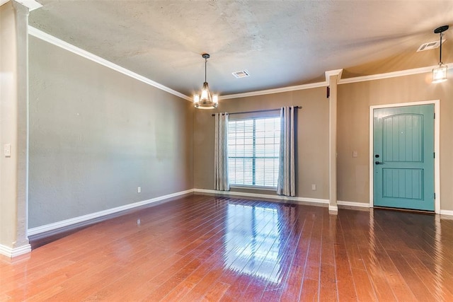 3393 Creek View Ct, Newcastle, OK 73065 - empty room with a chandelier, hardwood / wood-style floors, baseboards, and ornamental molding