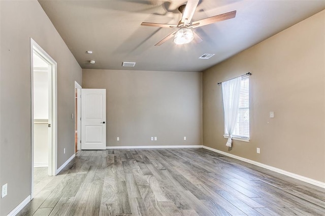 3393 Creek View Ct, Newcastle, OK 73065 - unfurnished room with ceiling fan, wood finished floors, and baseboards