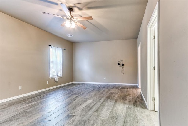 3393 Creek View Ct, Newcastle, OK 73065 - empty room with light wood-style flooring, a ceiling fan, and baseboards